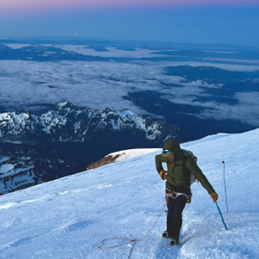 In the moment. On the way to the summit of Mt. Rainier, Mount Adams in the background